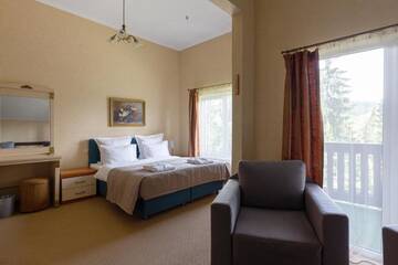 Четырехместный люкс в Отеле Bukovel Hotel